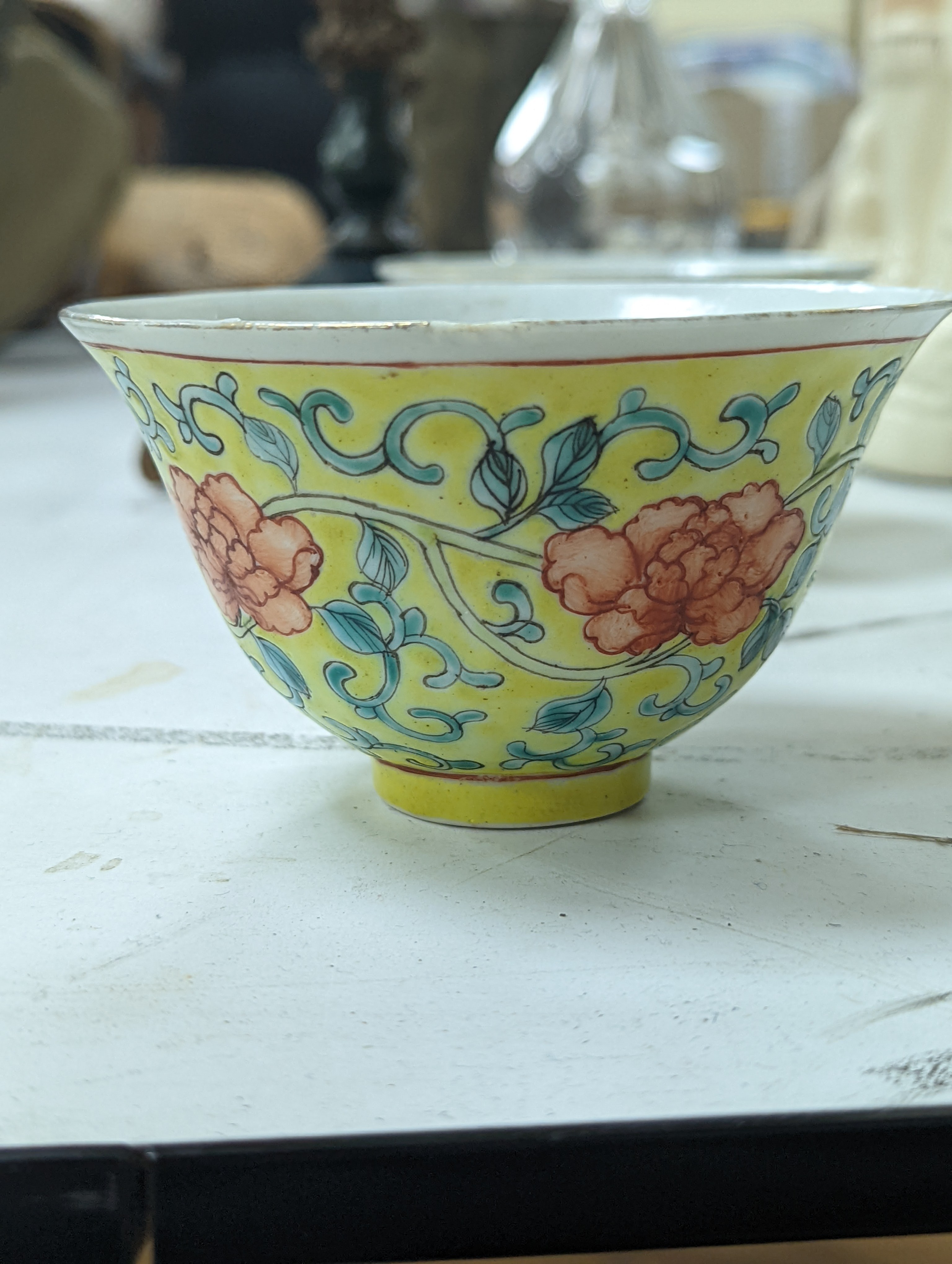 A group of Chinese porcelain, 19th /20th century, to include a pair of yellow ground bowls, 10.8 cm diameter, a blue and white vase, Xuande mark, a similar bowl and vase, and a champleve enamel bronze koro and cover